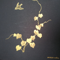 Ivy leaves in gold ink on black paper